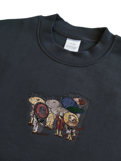 TRAVELERS IN THE RAIN SWEATSHIRT